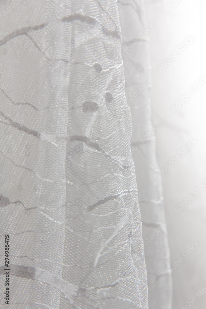 Obraz premium Details of the bride dress fabric and beautiful embroidery wedding concept used as a background for illustrations