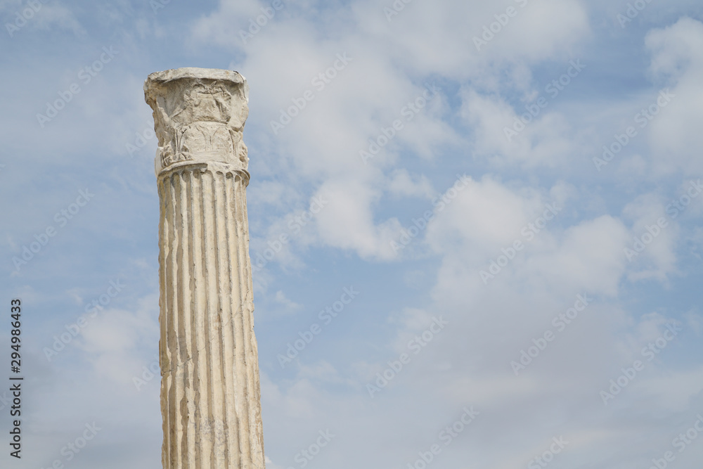 Single Greek Doric pillar against sky