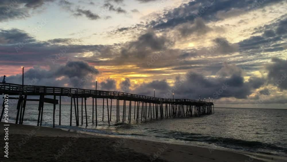 Sunrise over the fishing pier at North Carolina Outer Banks Sunrise over the fishing pier at North Carolina Outer Banks