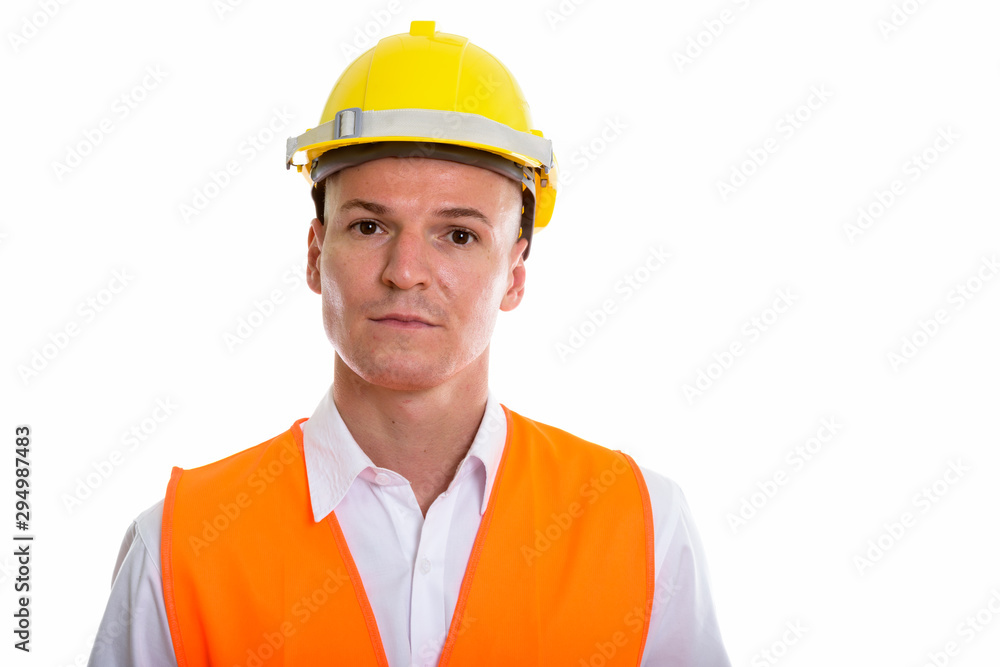 Studio shot of young handsome man construction worker Studio shot of young handsome man construction worker
