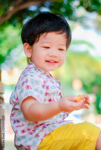 Cute little  Asian boy Happy smilling  in the park outdoors   Happy kids