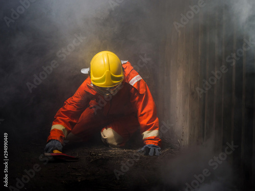 firefighter spray water to fire burning car workshop fire training