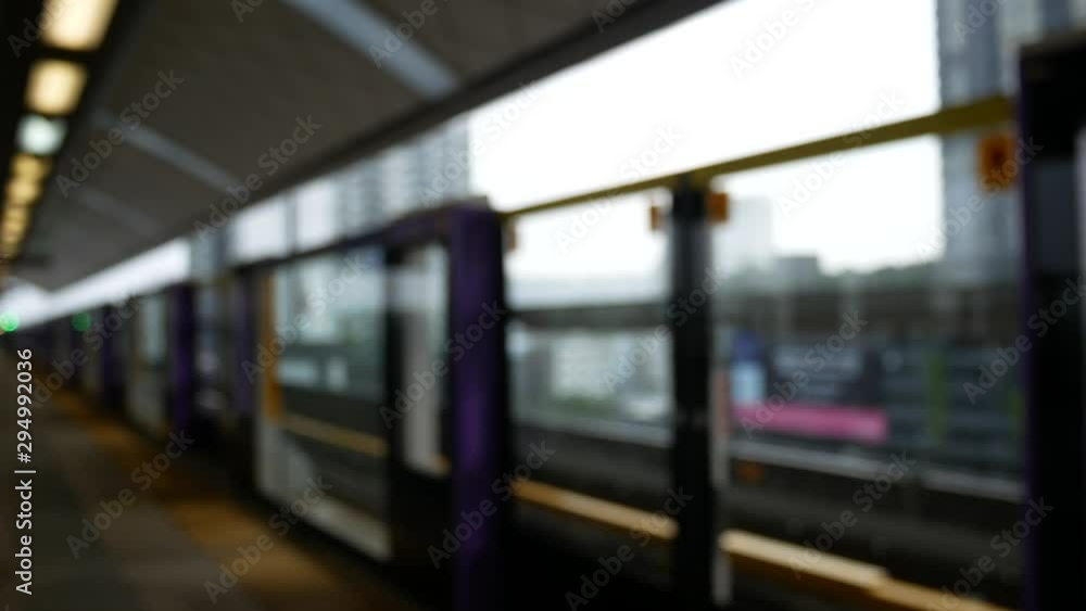Blurred train arrival in the station. Blurred train arrival in the station.