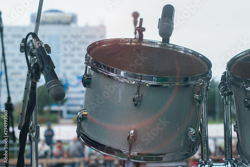 Drum kit close-up, microphones to amplify the drums,