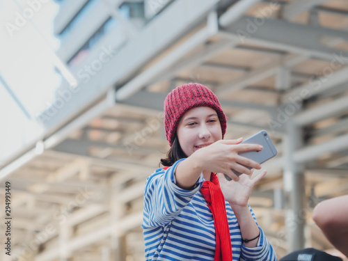 Young woman torist traveling on the city photo