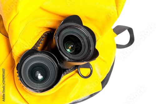 Yellow Backpack Photographer's equipment , isolated on white background. photo