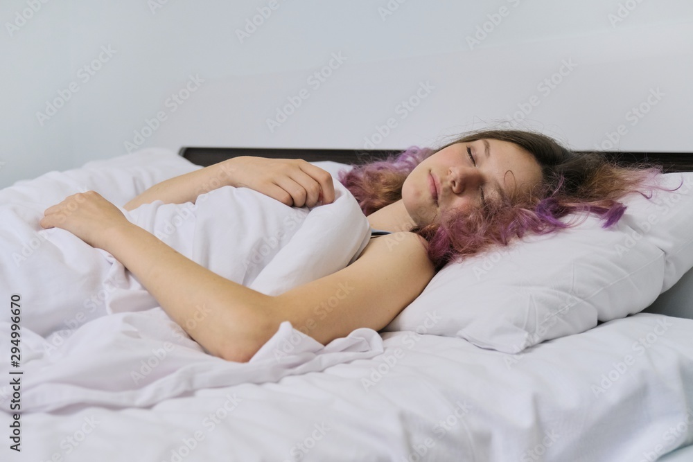 Teen girl sleeping at home in bed Teen girl sleeping at home in bed