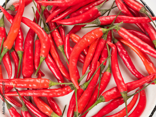 Top view of hot chili pepper on white background