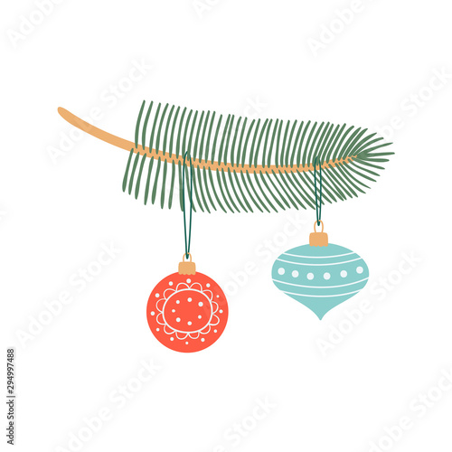 Festive fir tree sprig decorated with hanging Christmas toys. Botanical New year design element isolated on white backgrounds.