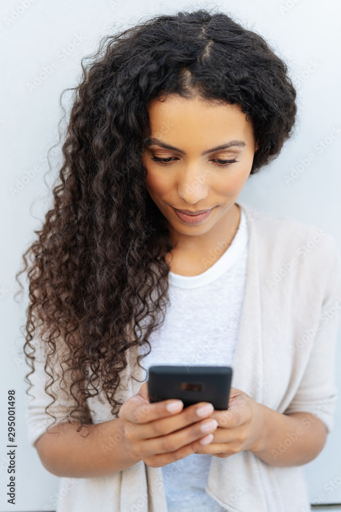 Young African woman with long wavy hair Young African woman with long wavy hair