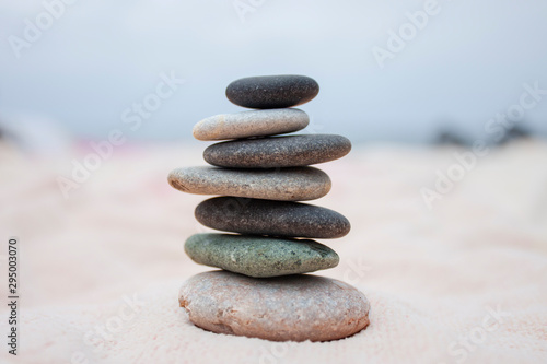 Stack of stones against seascape