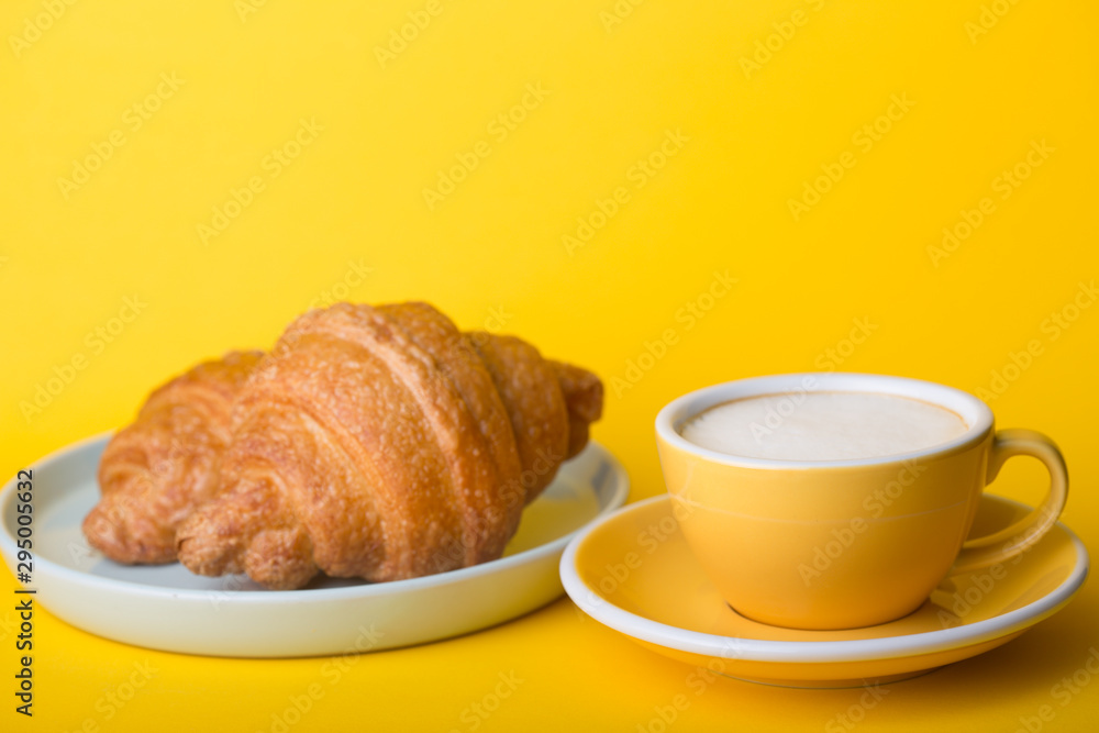 yellow cup on a yellow background