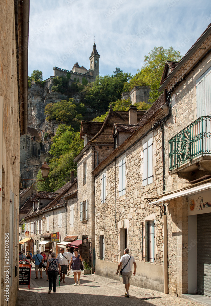 Fototapeta premium Tourists walking in the medieval centre of Rocamadour. France