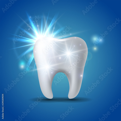 White shining tooth, concept whitening of human tooth.