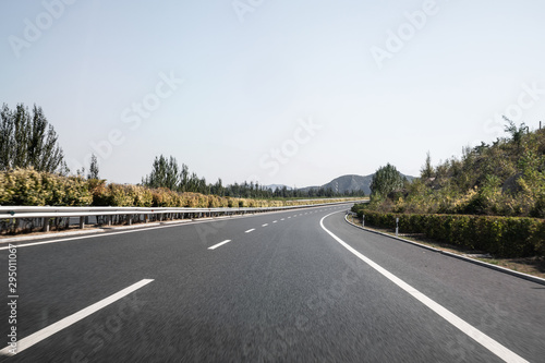 Curved country road in autumn