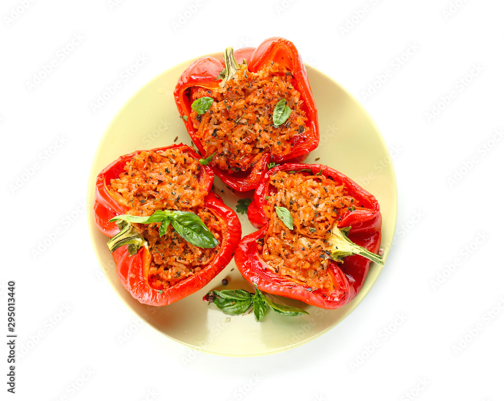 Plate with tasty stuffed pepper on white background Plate with tasty stuffed pepper on white background