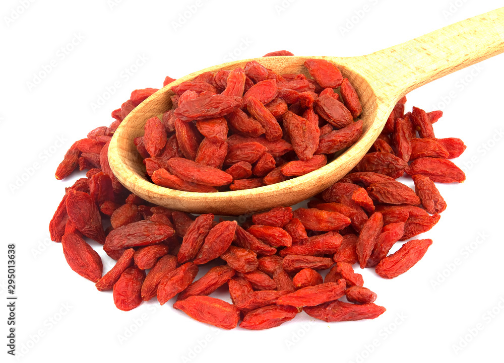 goji berries with wooden spoon isolated on a white background.