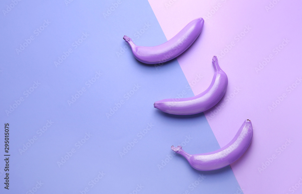 Ripe painted bananas on color background Ripe painted bananas on color background