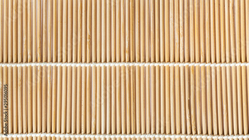 panoramic background of mat from wooden sticks