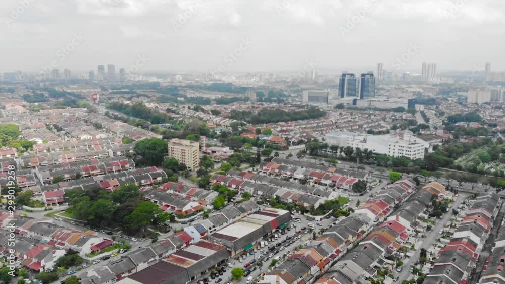 Top Aerial View Of Residential Housing With Colorful Cars And City Views - Forwards Top Aerial View Of Residential Housing With Colorful Cars And City Views - Forwards