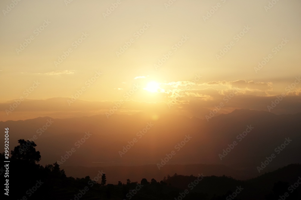 Nature background with sky in sunset time.