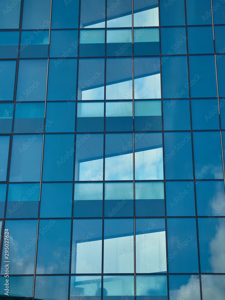 Architectural buildings of a modern city. Glass, metal structures - new technologies in construction. Architectural buildings of a modern city. Glass, metal structures - new technologies in construction.