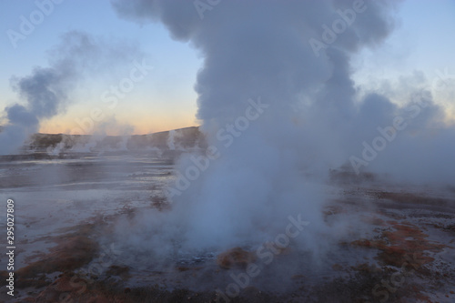 Northern Chile - San Pedro de Atacama and surrounding area - El Tatio geyser field and the hundreds of rocky geysers venting from dawn until dusk illuminated beautifully by the sunrise