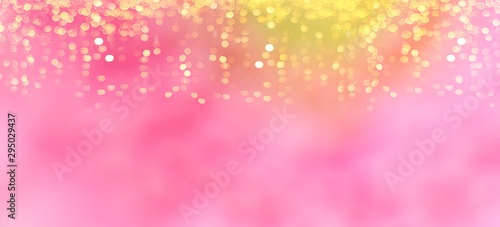 Blurred Christmas banner background with different shades of pink with highlights stars