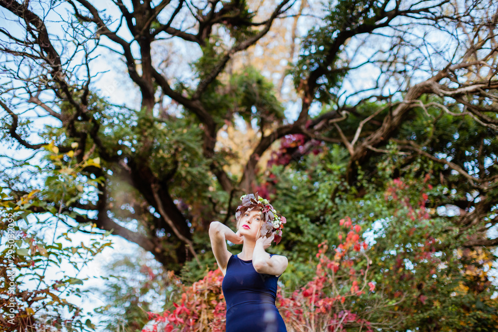 Sensual woman over the autumnal old oak tree Sensual woman over the autumnal old oak tree