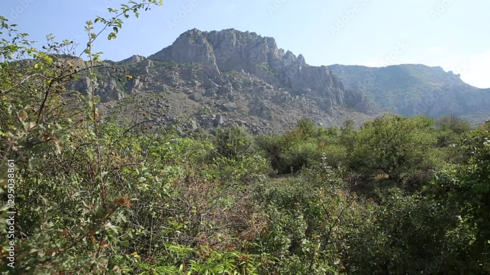 Path to famous Ghost Valley with strangely shaped rocks. Demerdji mountains. Crimea Path to famous Ghost Valley with strangely shaped rocks. Demerdji mountains. Crimea
