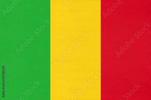 Mali national fabric flag, textile background. Symbol of world african country.