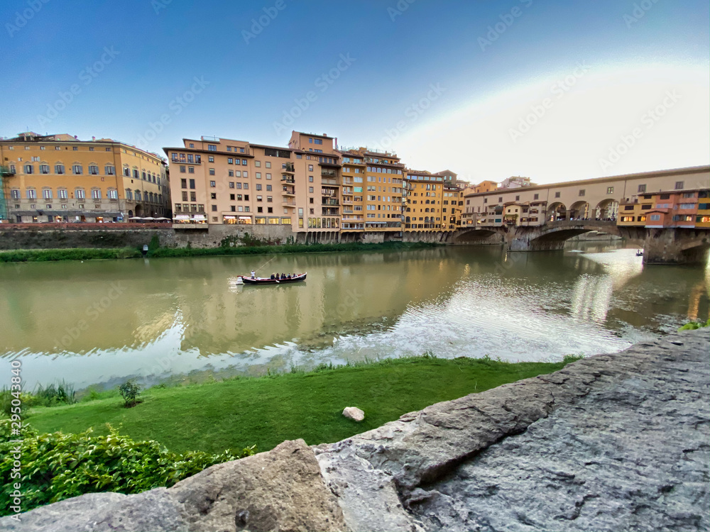 Fototapeta premium Old Bridge and Florence Lungarni at dusk, Italy