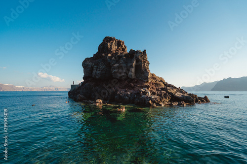 Amoudi Bay, Santorini, Greece. A popular place to swim on the island, the rock provides the perfect spot to snorkle and jump off of. 