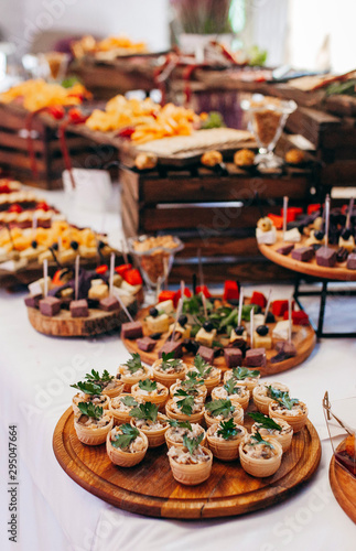 Luxury food and drinks on corporate party table. © andrew_shots