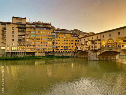Old Bridge and Florence Lungarni at night. Panoramic cityscape in Autumn  Tuscany - Italy