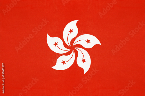 Hong Kong national fabric flag, textile background. Symbol of international asian world country.