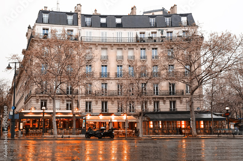 Small Paris square street view on a cloudy rainy day. photo