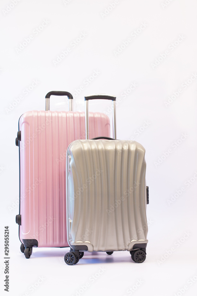 Pink and gray luggage trolley bag side isolated on white background,  Compact plastic travel bag. Travel plan, trip vacation, tourism. Photos |  Adobe Stock