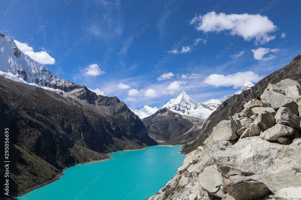 Obraz premium Peru - Hiking around Huaraz to laguna 69 and lake paron in the andes - turquoise blue lakes with snow capped mountains surrounding creating stunning scenery