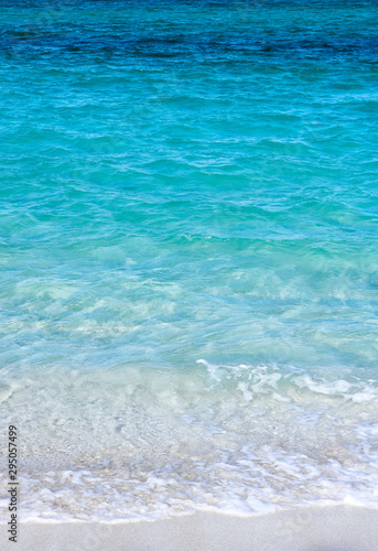 Background texture of crystal clear, turquoise water.
