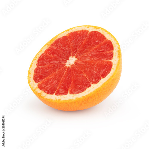 Half sliced fresh orange grapefruit/pomelo with red juicy pulp, isolated on a white background front side.