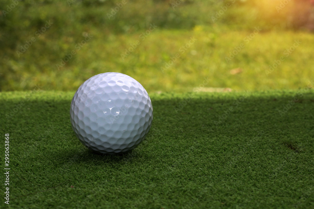 Golf equipment in beautiful golf course at sunset background. Golf equipment in beautiful golf course at sunset background.