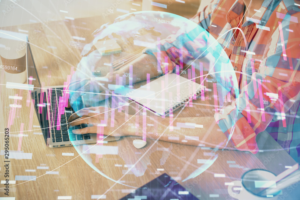 Multi exposure of forex graph with man working on computer on background. Concept of market analysis. Multi exposure of forex graph with man working on computer on background. Concept of market analysis.
