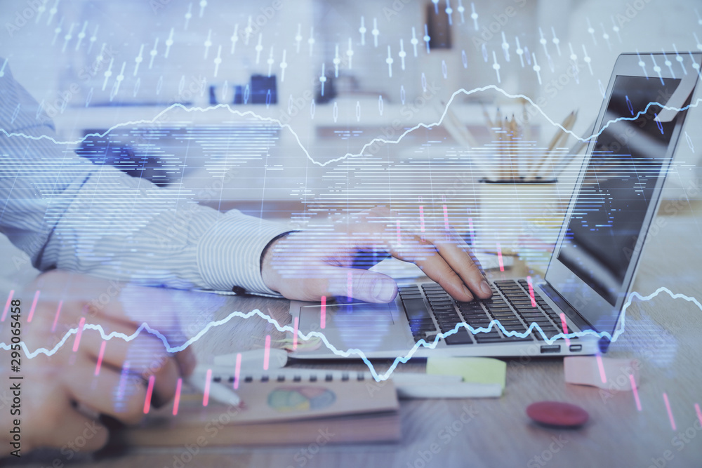 Multi exposure of stock market chart with man working on computer on background. Concept of financial analysis. Multi exposure of stock market chart with man working on computer on background. Concept of financial analysis.