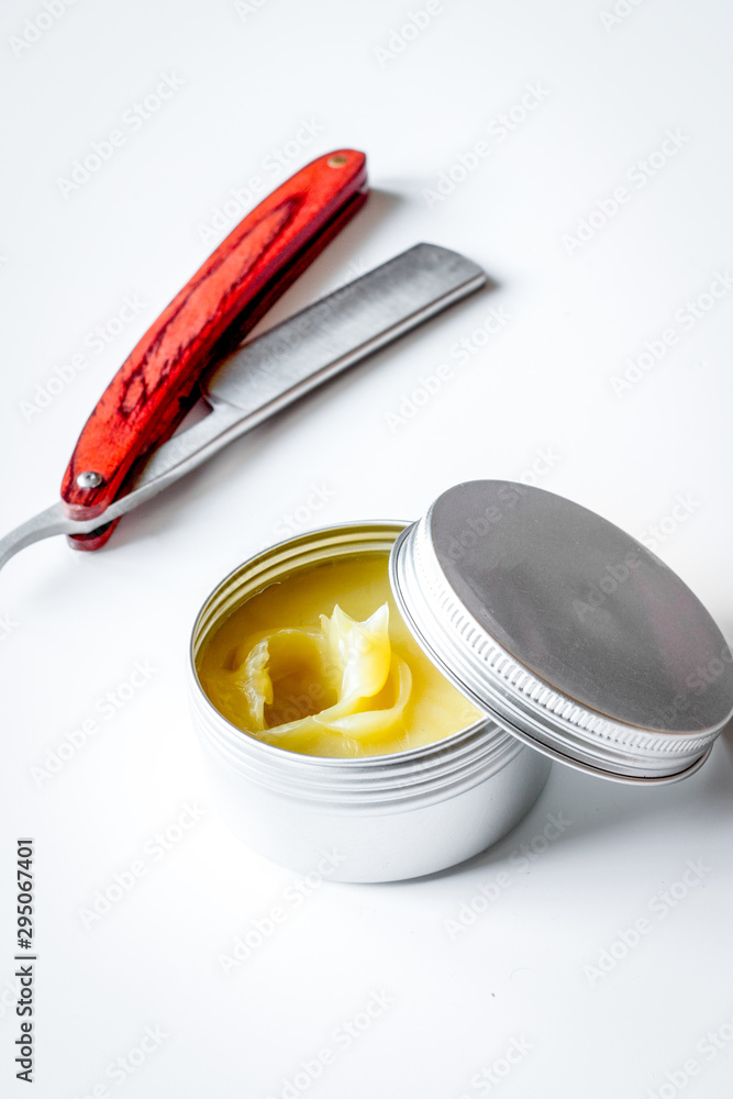 white desktop with tools for shaving beards white desktop with tools for shaving beards