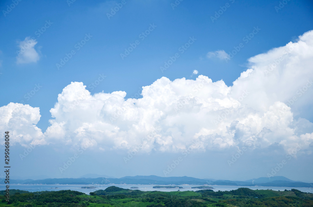 A cloud of clouds rising over the seaside village, Taean County, Korea A cloud of clouds rising over the seaside village, Taean County, Korea