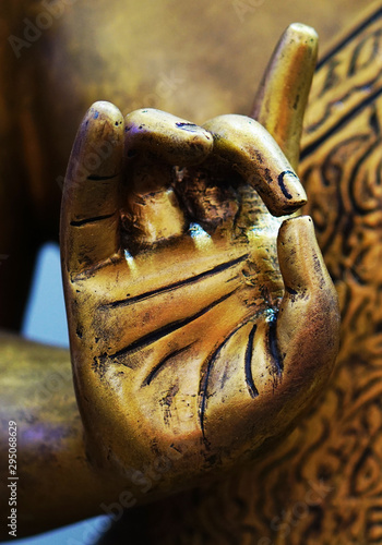 Closeup of hand of Buddha in meditation pose