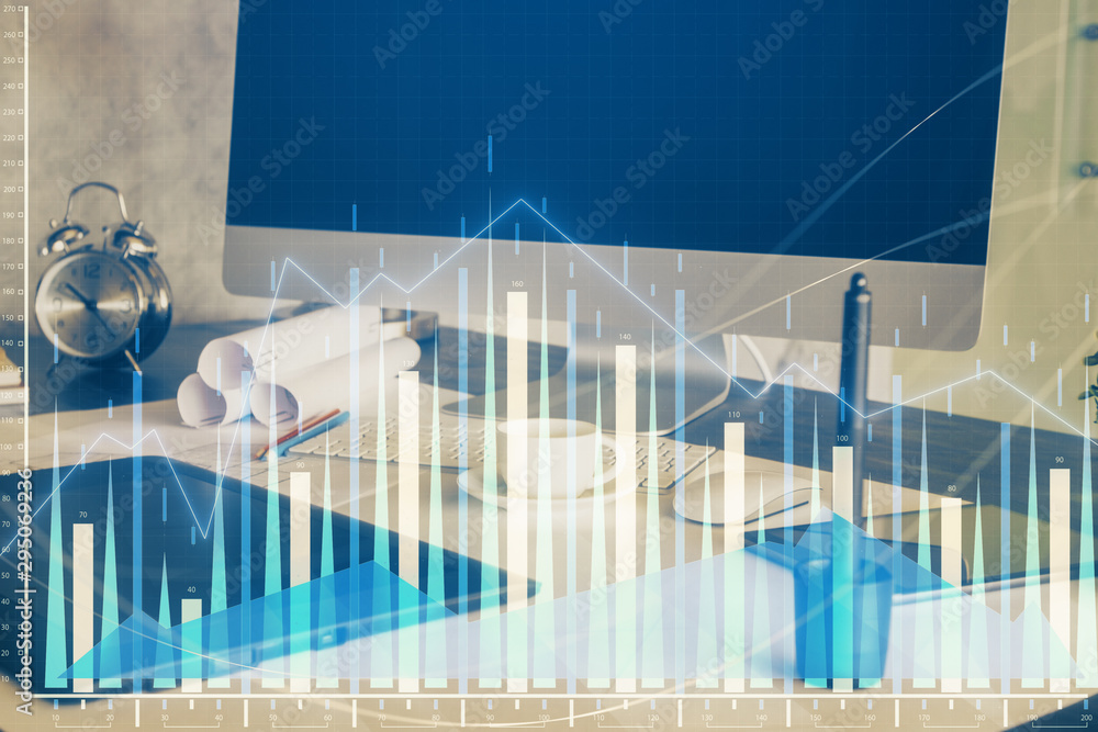 Naklejka premium Stock market chart hologram drawn on personal computer background. Multi exposure. Concept of investment.