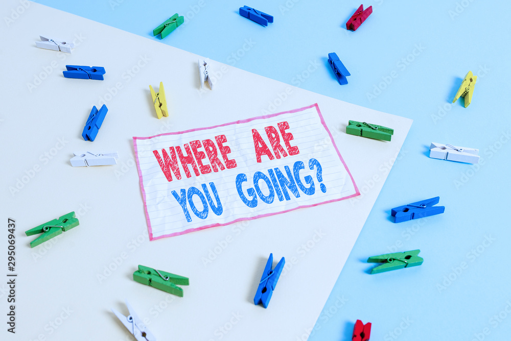 Conceptual hand writing showing Where Are You Going Question. Concept meaning asking someone where he is heading to Colored clothespin paper reminder with yellow blue background