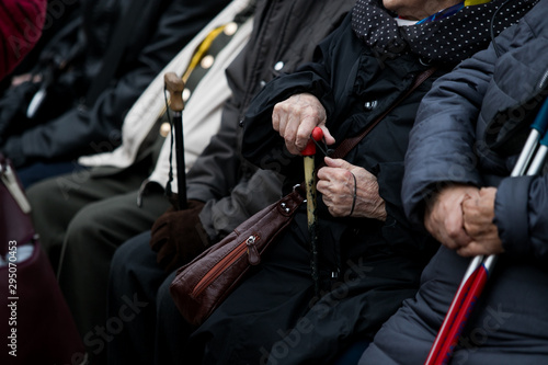senior citizens sitting on a bench russia